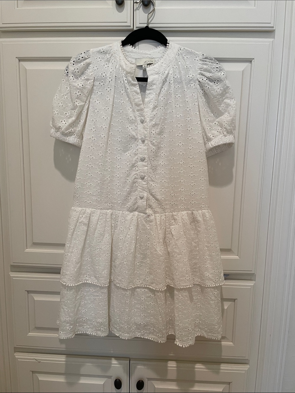 White eyelet dress with tiered skirt